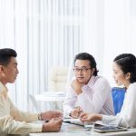 Communicating young businesspeople